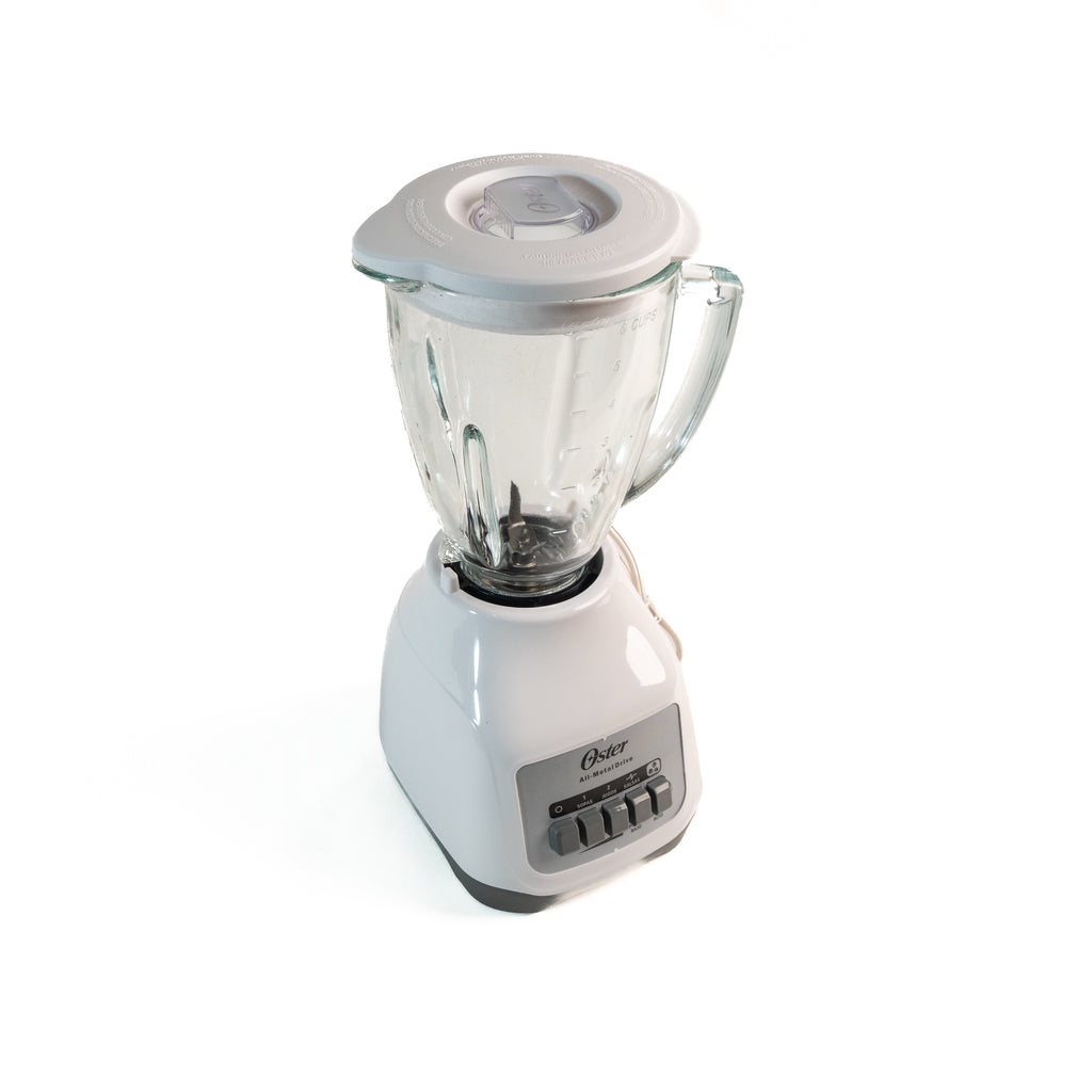 LICUADORA VASO VIDRIO BLANCA CON BOTON